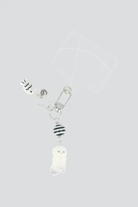 Charm cel nutria tierna sold by Shasa