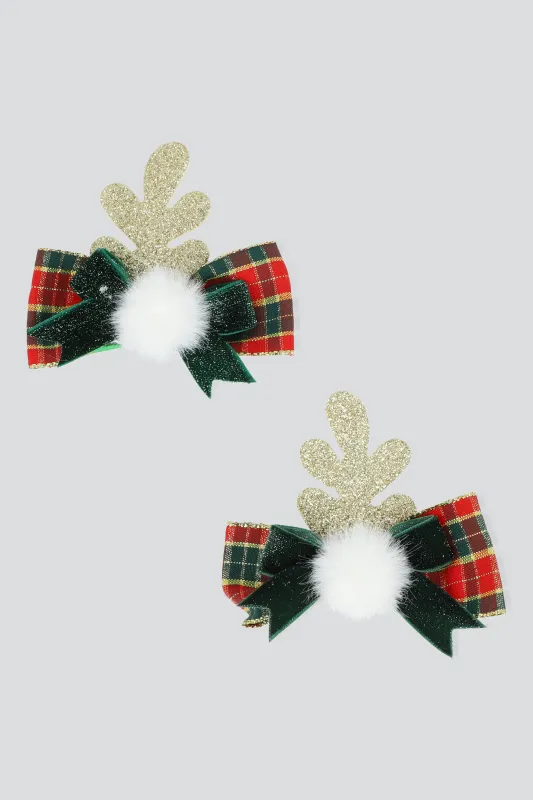 Set 2 broches cuernos moños sold by Shasa