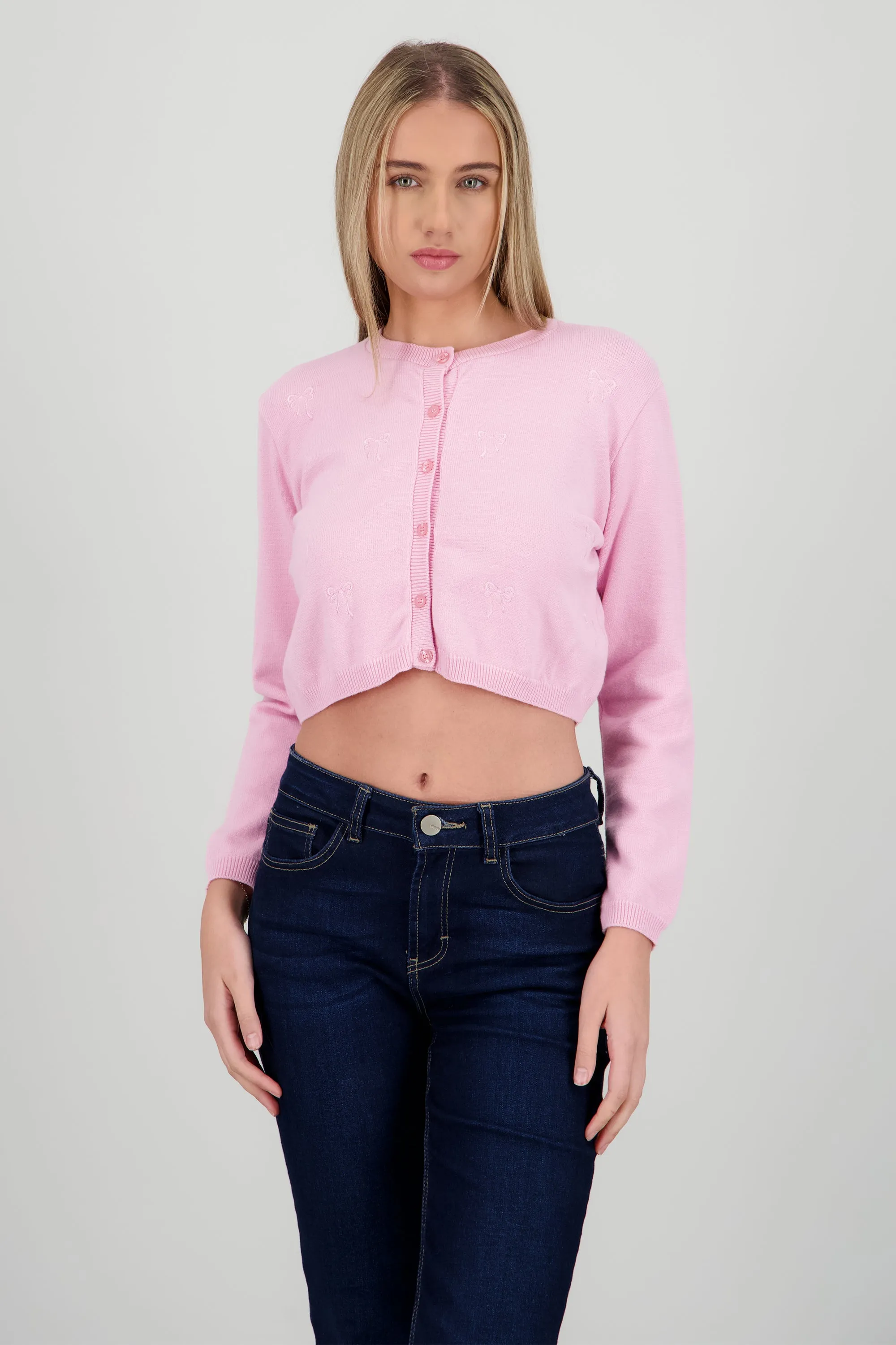 Cardigan detalle de bordado moños sold by Shasa