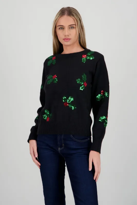 Sueter hojas navidad sold by Shasa