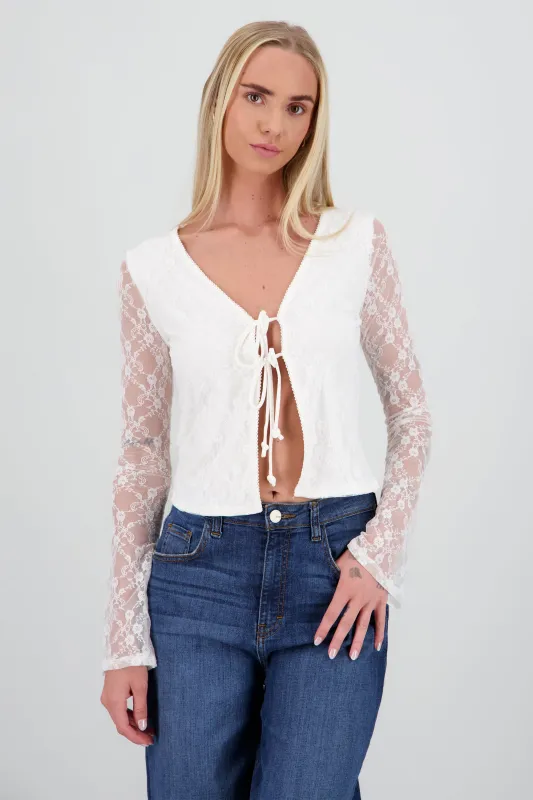 Blusa de encaje con moños sold by Shasa