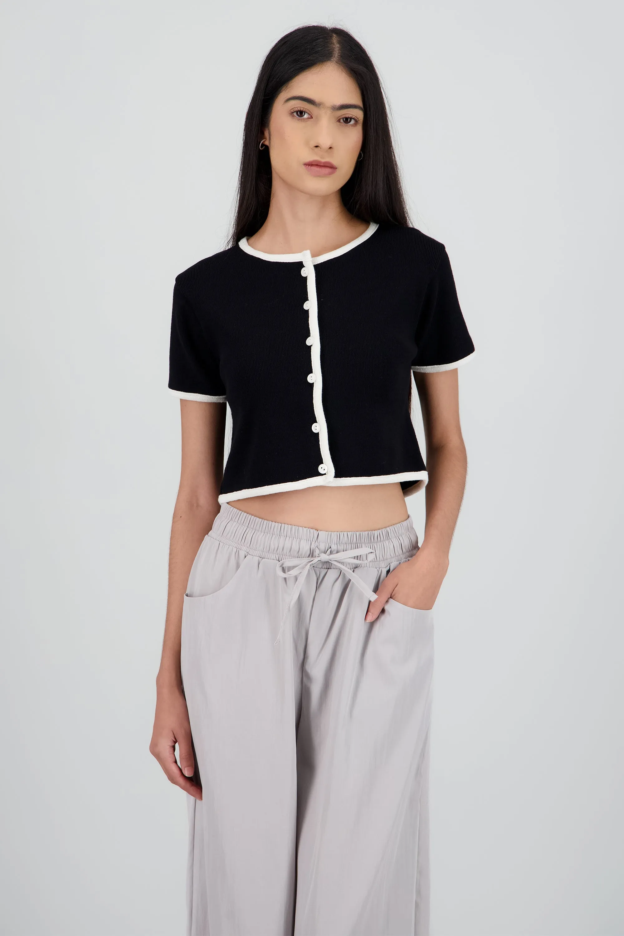 Top tejido manga corta contraste sold by Shasa