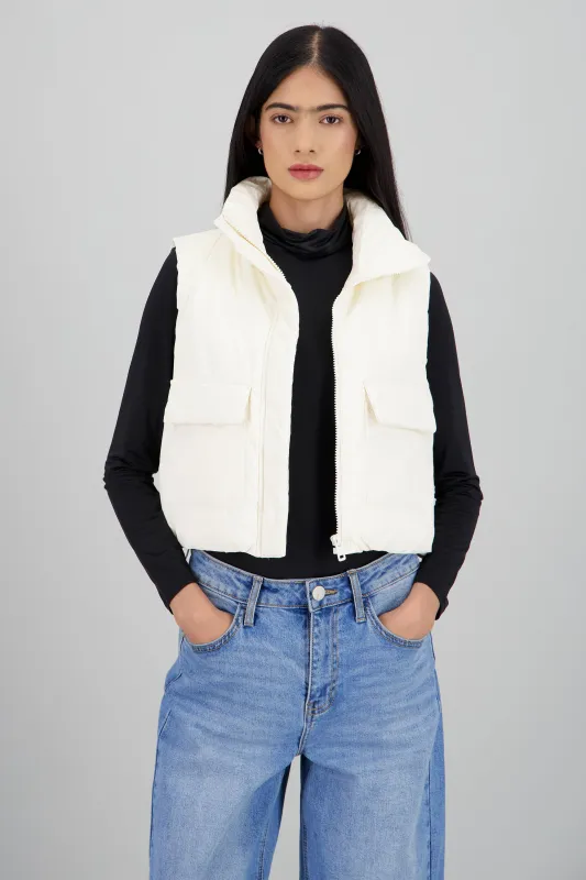 Chaleco capitonado detalle bolsas sold by Shasa