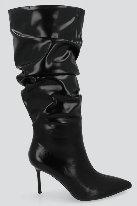 Bota alta pointy slouchy sold by Shasa