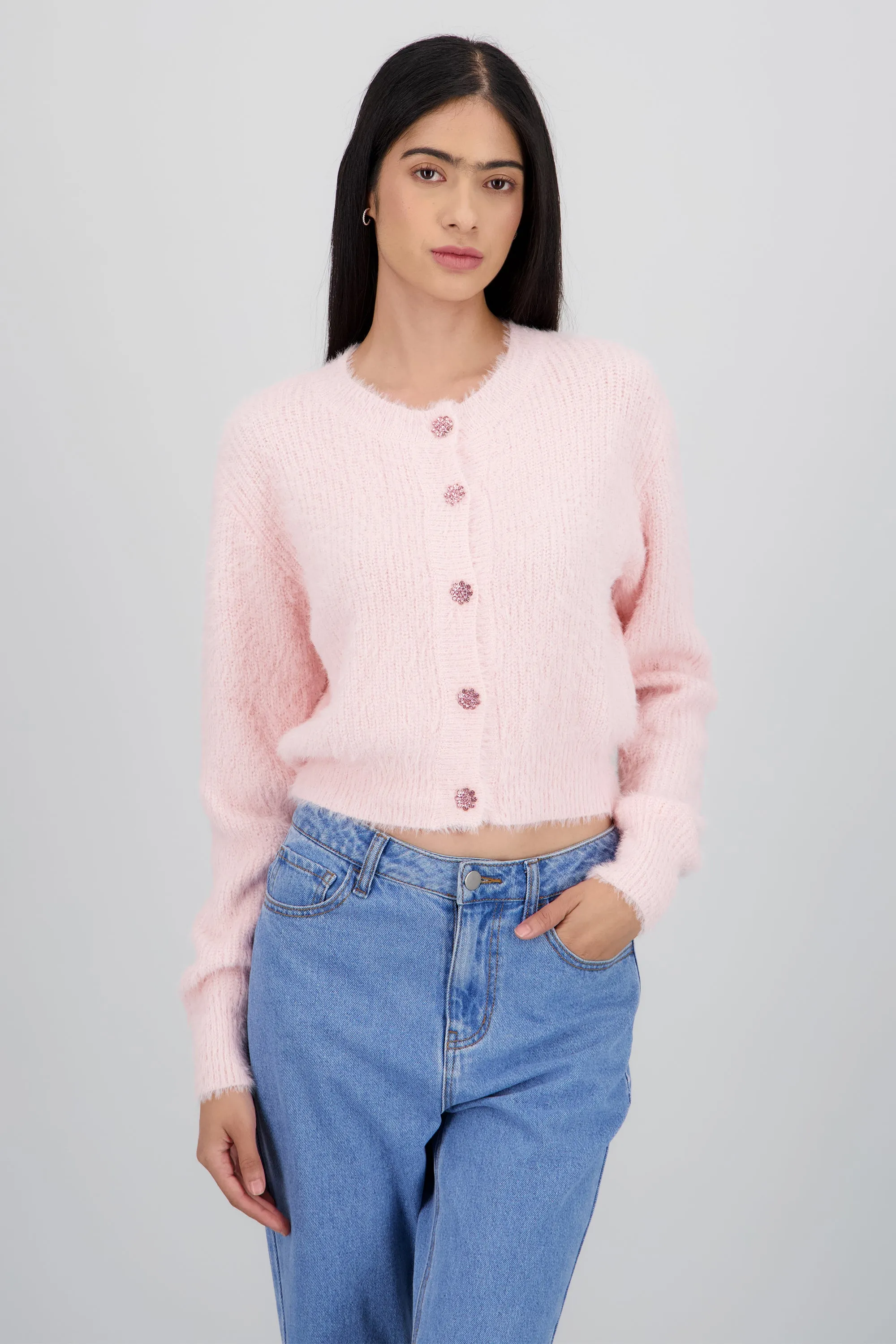 Cardigan tejido boto flores brillos sold by Shasa