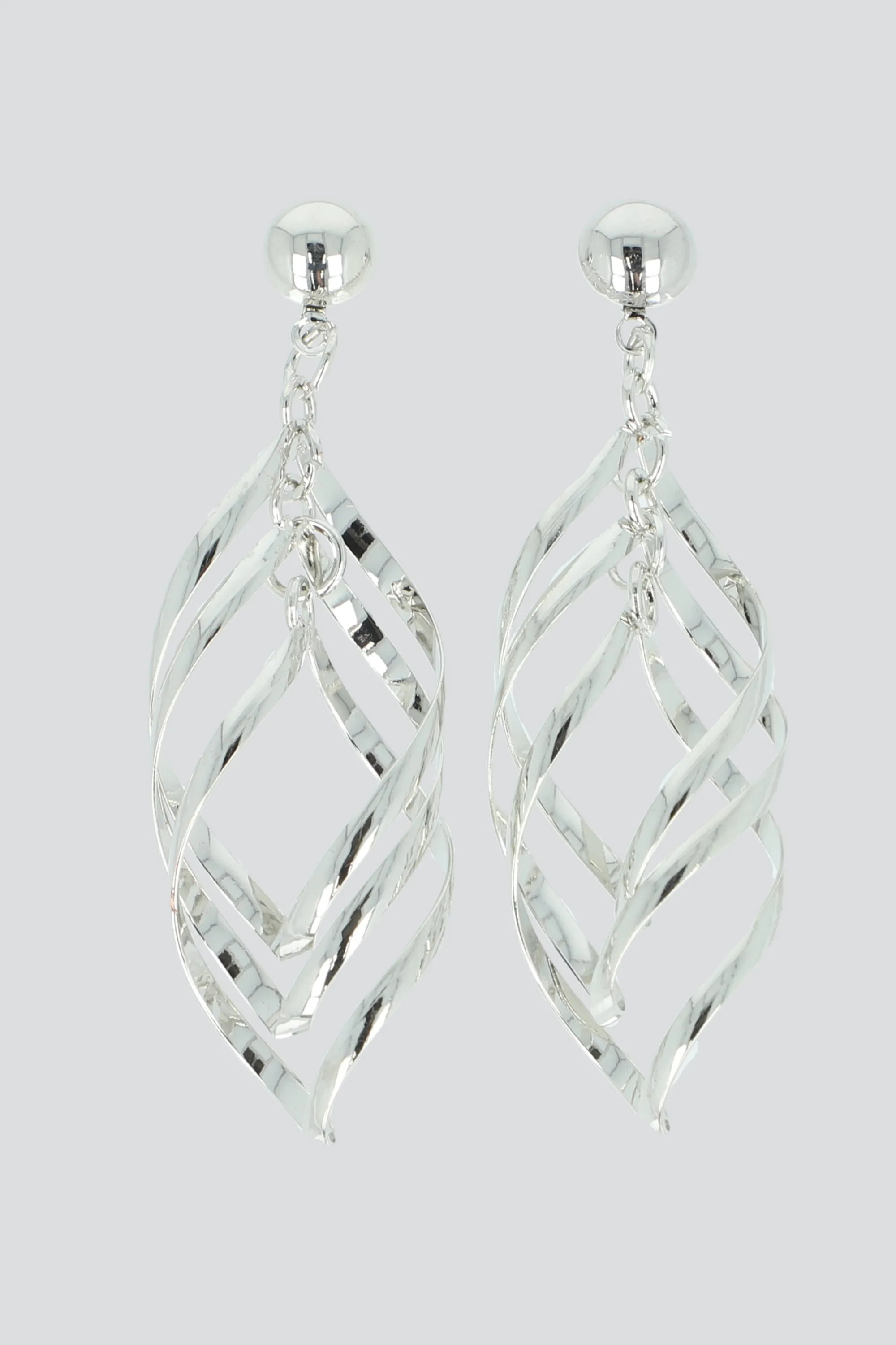 Aretes remolino metal sold by Shasa