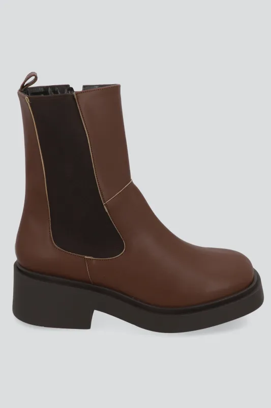 Botin elastico punta cuadrada sold by Shasa