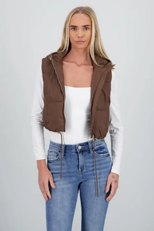 Chaleco capitonado con gorro sold by Shasa