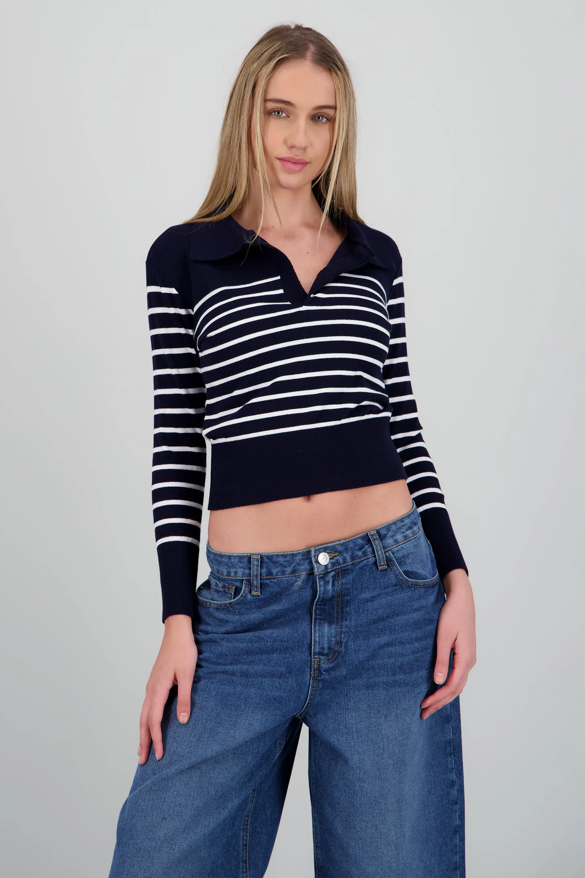 Sueter rayas cuello polo sold by Shasa