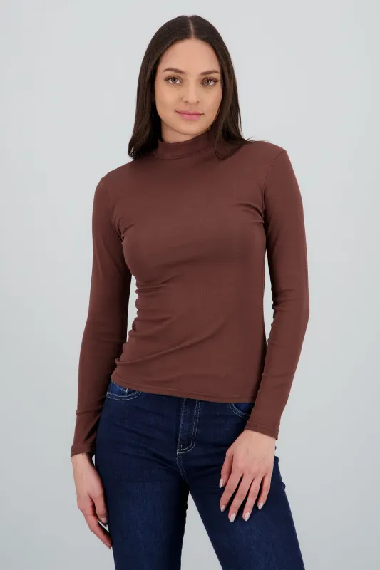 Top liso manga larga cuello alto sold by Shasa