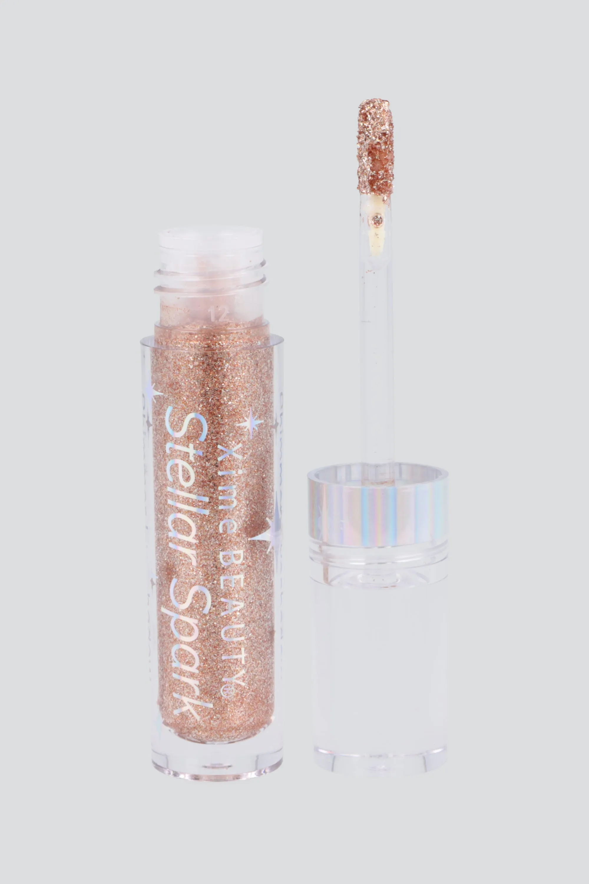 Sombra e iluminador glitter sold by Shasa