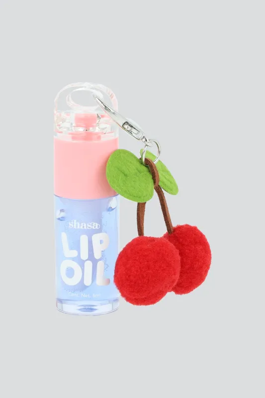 Lip oil charm cerezas pompon sold by Shasa