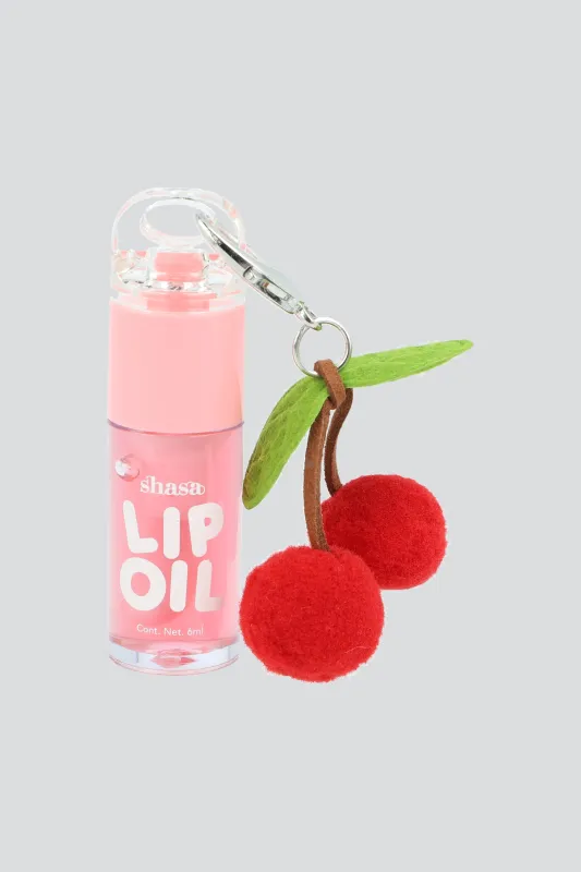 Lip oil charm cerezas pompon sold by Shasa