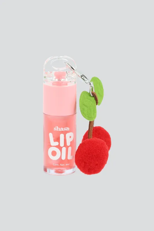 Lip oil charm cerezas pompon sold by Shasa