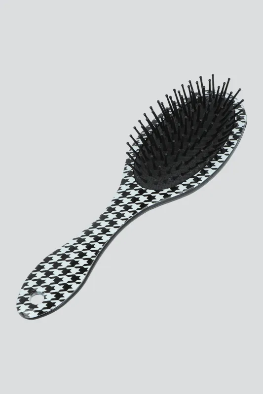 Cepillo pata de gallo sold by Shasa