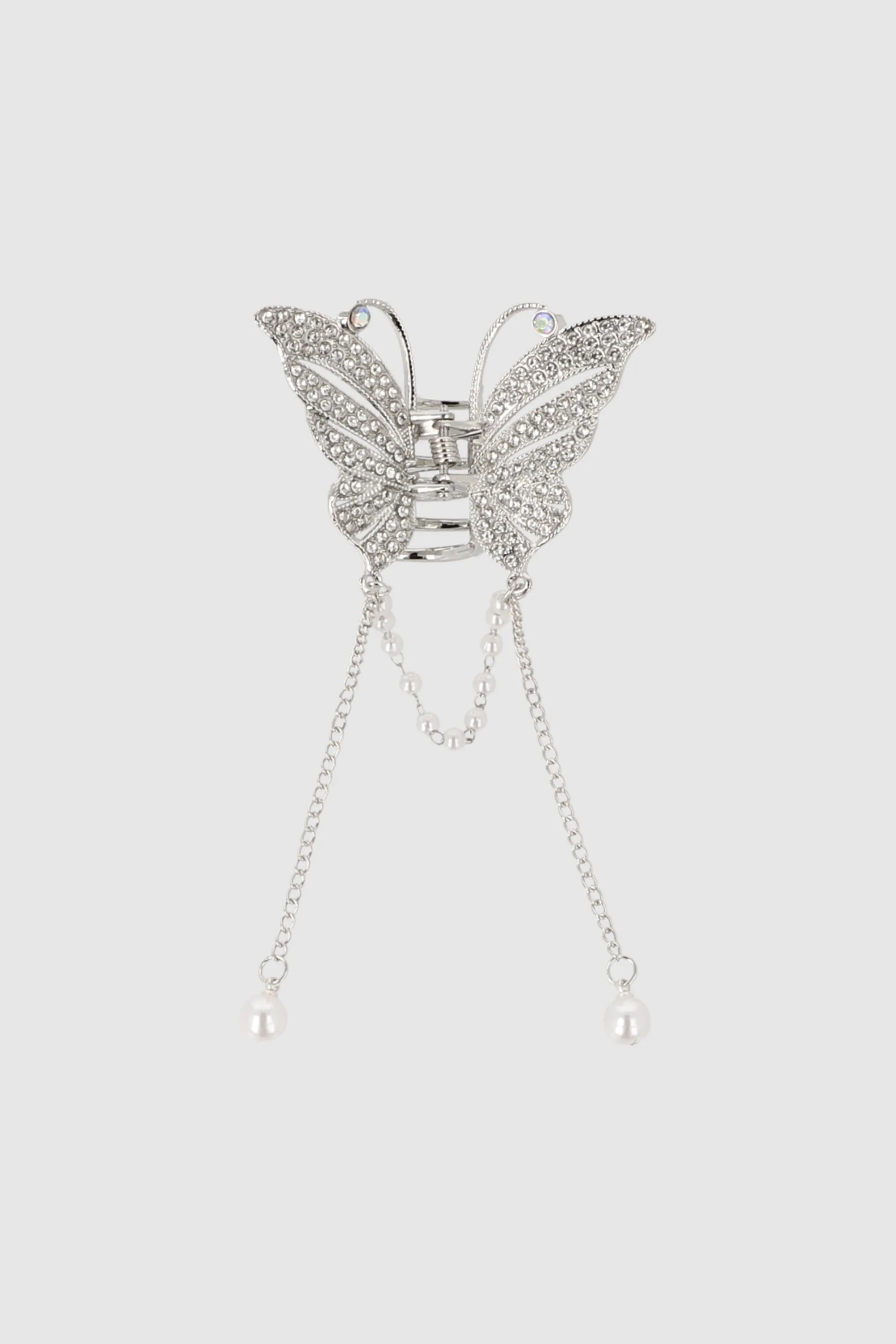 Pinza Mariposa Con Perlas En Caída sold by Shasa