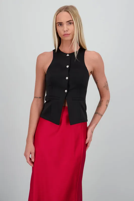 Chaleco detalle botones flor sold by Shasa