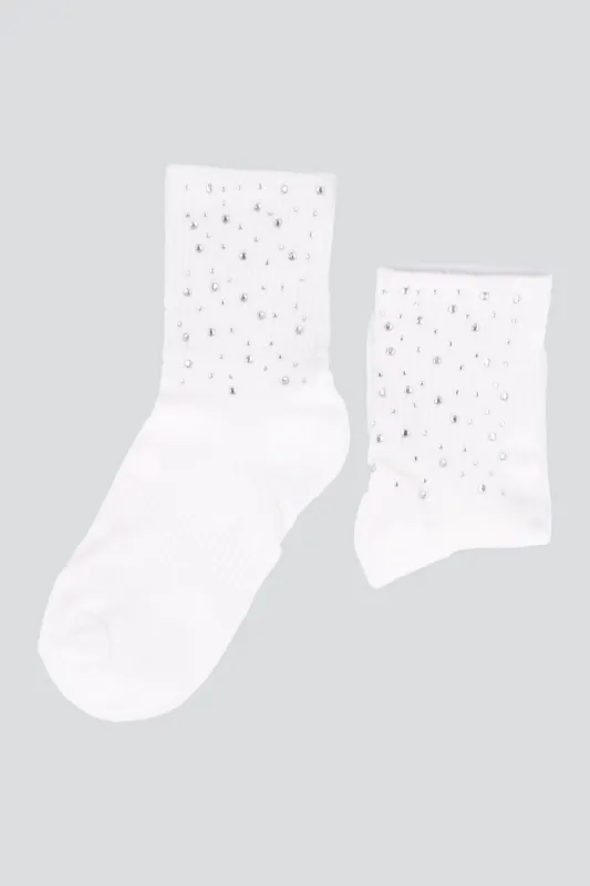 Calcetin brillos sold by Shasa