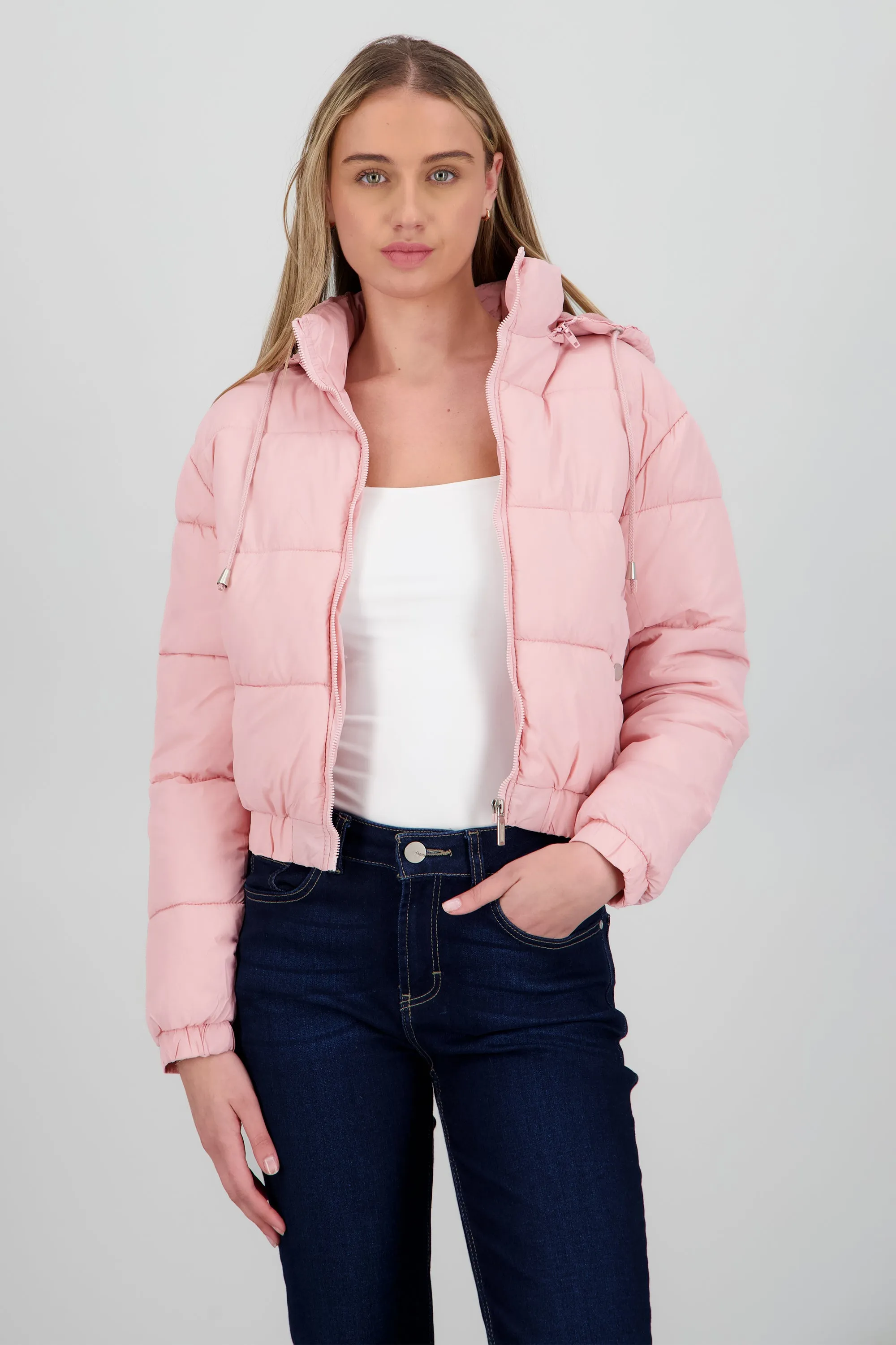 Chamarra puffer con gorro y bolsas sold by Shasa