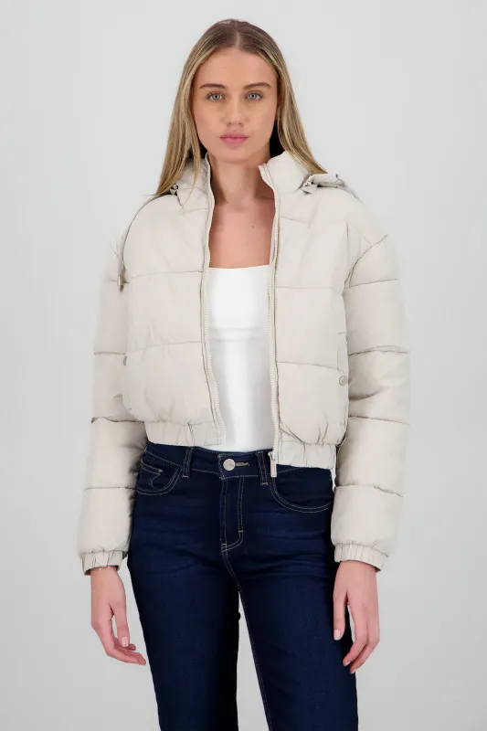 Chamarra puffer con gorro y bolsas sold by Shasa