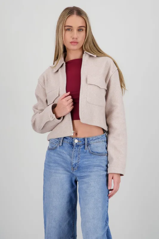 Chamarra con cierre det bolsas sold by Shasa