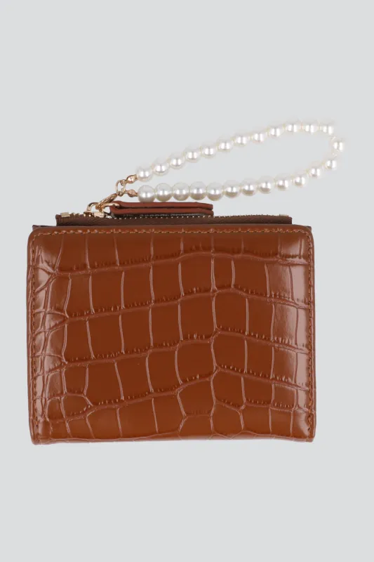 Cartera croco charm perlas sold by Shasa