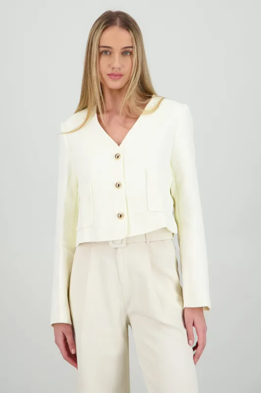 Saco cuello V detalle botones sold by Shasa