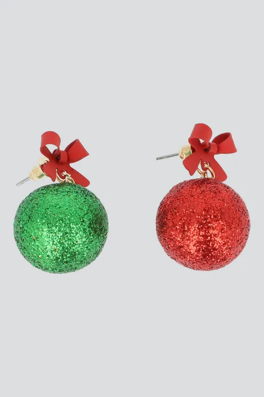 Aretes esferas moño sold by Shasa