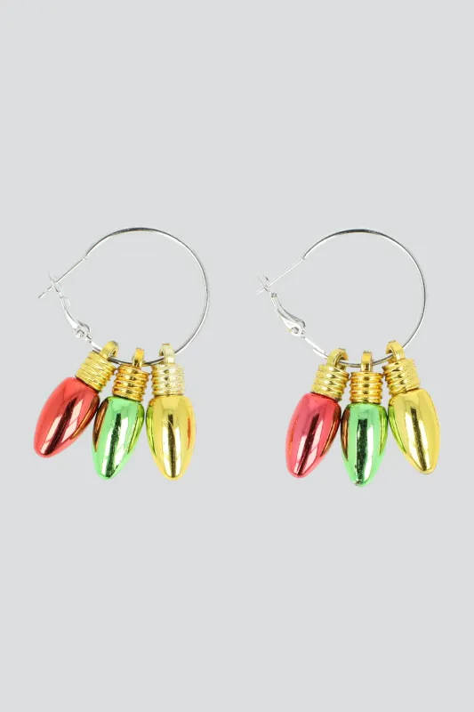 Arracadas focos navideños sold by Shasa