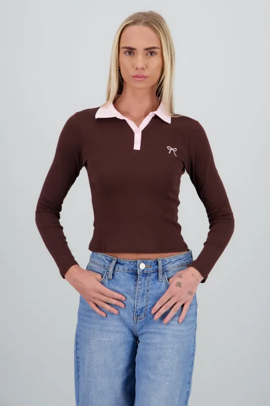 Top cuello polo bordado moño sold by Shasa