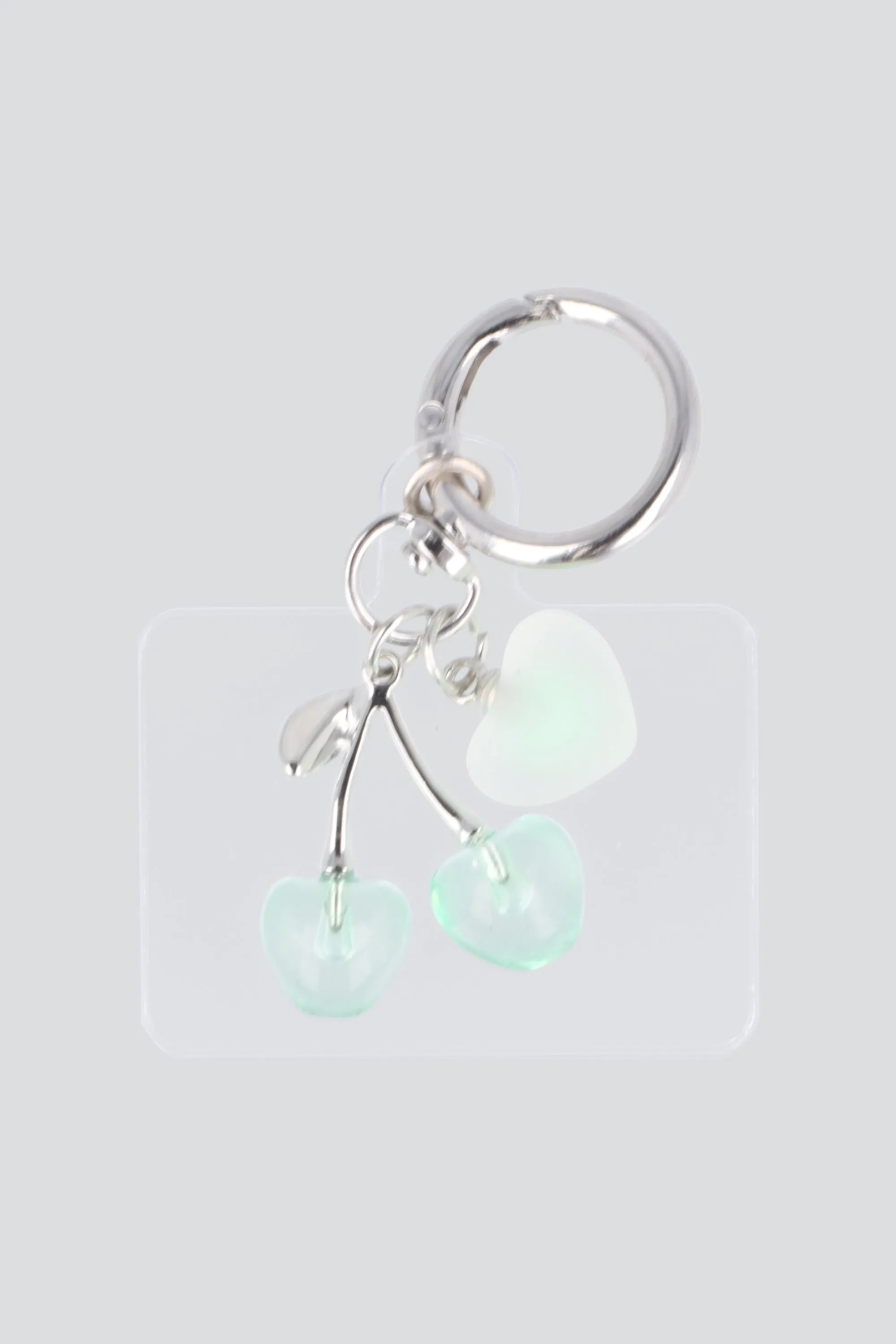 Charm cel corazon cerezas sold by Shasa