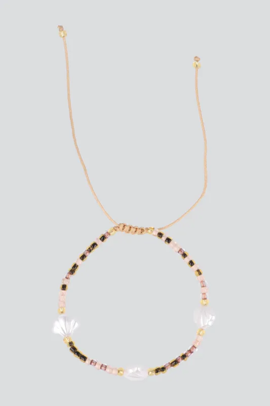 Anklet beads mini conchitas sold by Shasa