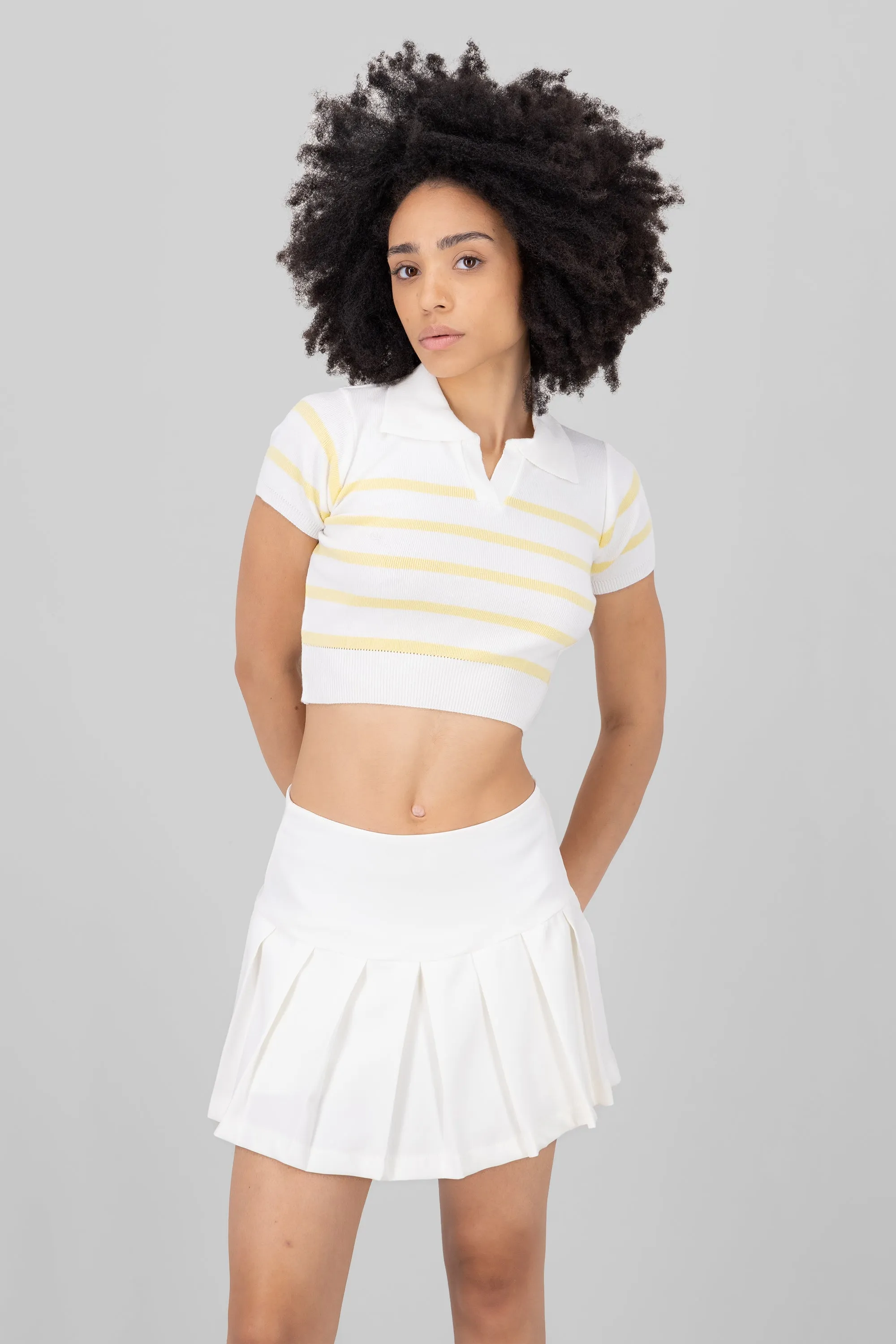 Top tejido cuello polo rayas sold by Shasa