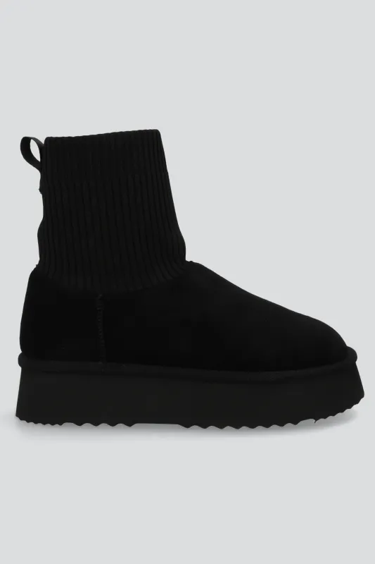 Bota invierno calceta tejida sherpa sold by Shasa