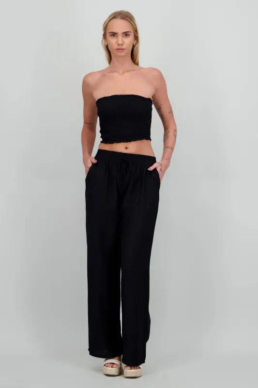 Pantalon amplio liso con resorte sold by Shasa
