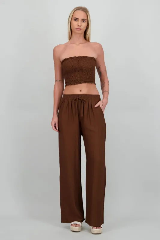 Pantalon amplio liso con resorte sold by Shasa