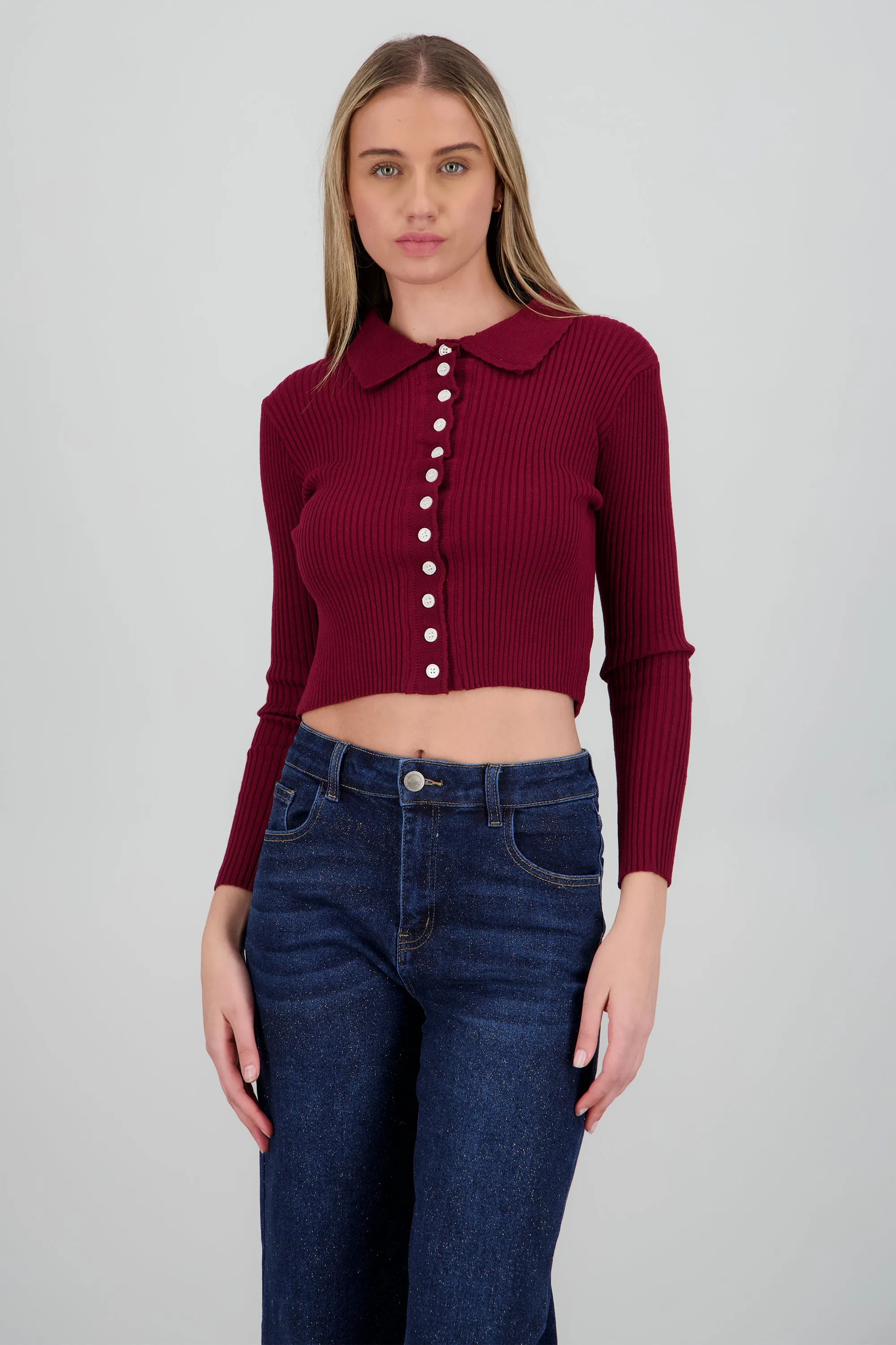 Top tejido tipo polo con botones sold by Shasa