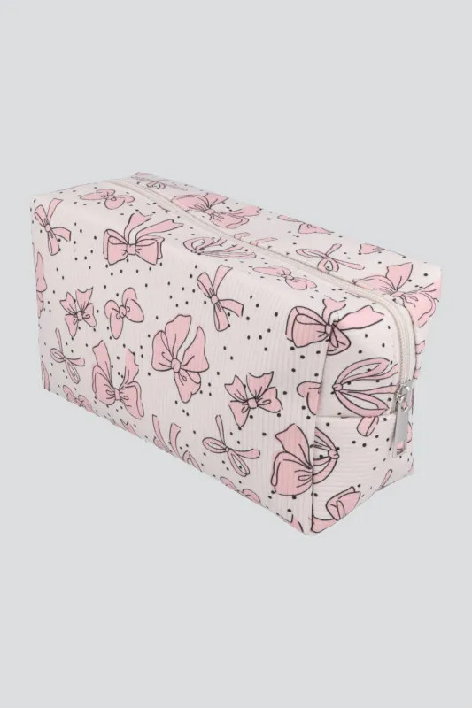 Cosmetiquera moños sold by Shasa