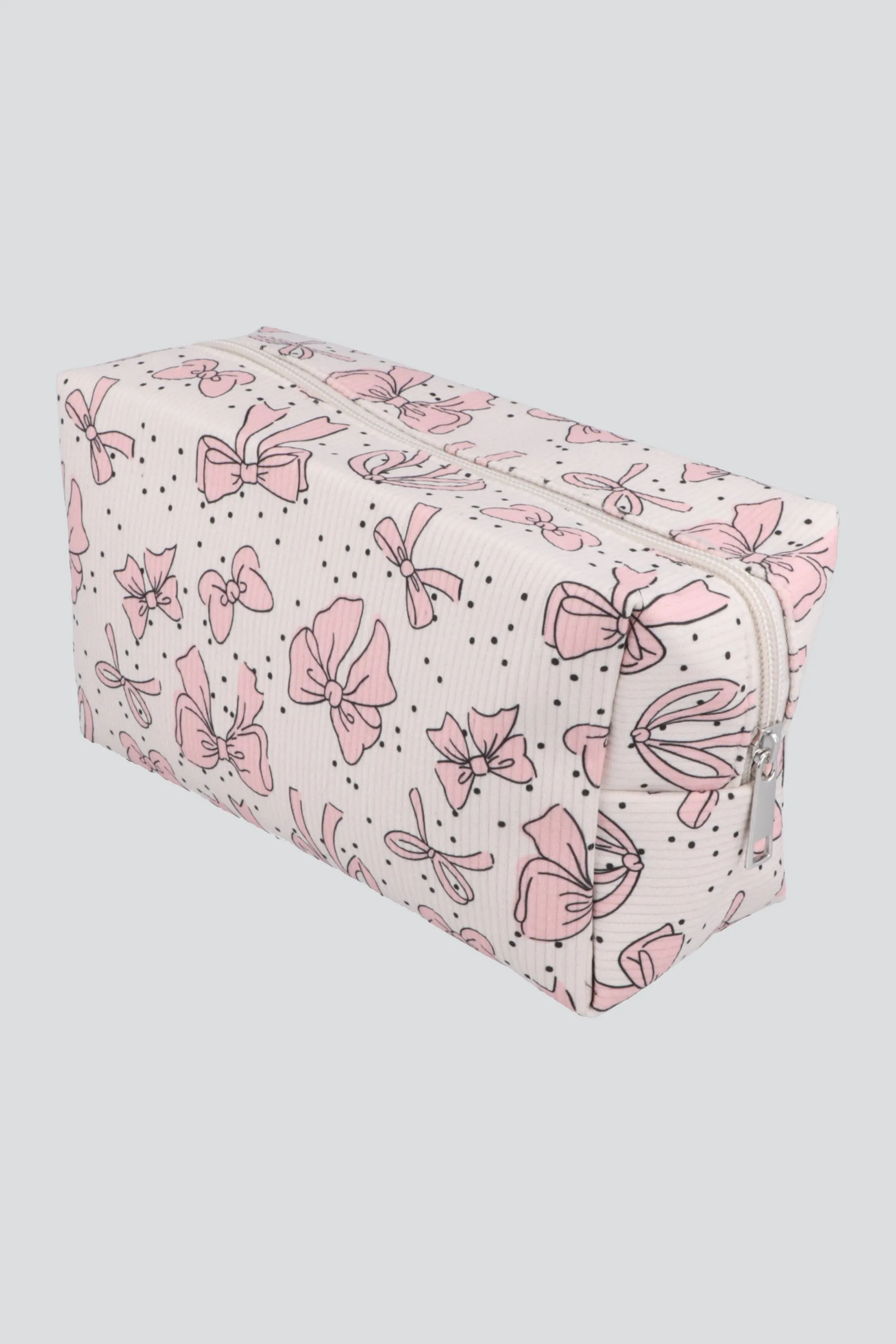 Cosmetiquera moños sold by Shasa