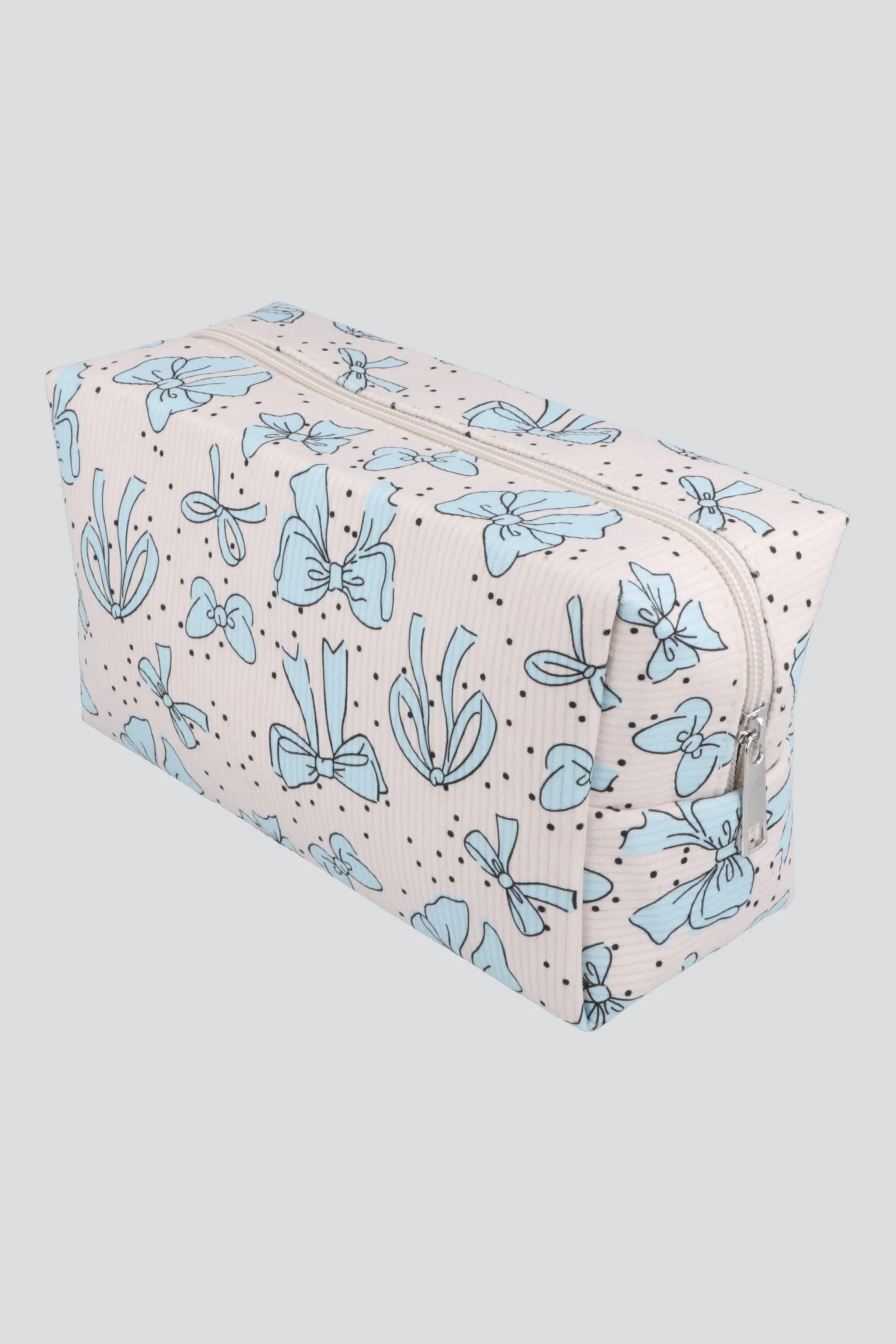 Cosmetiquera moños sold by Shasa