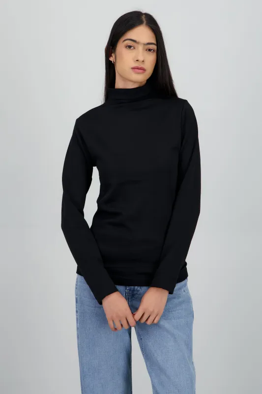 Top cuello alto manga larga liso sold by Shasa