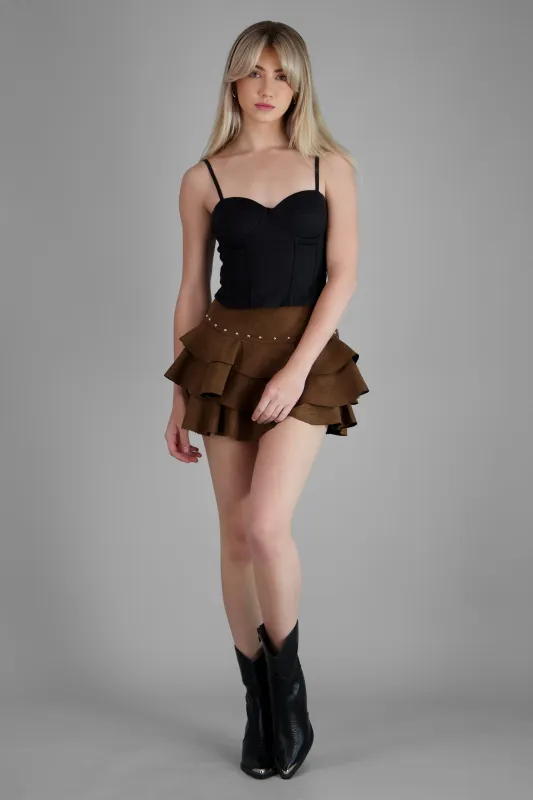 Falda olanes suede estoperoles sold by Shasa