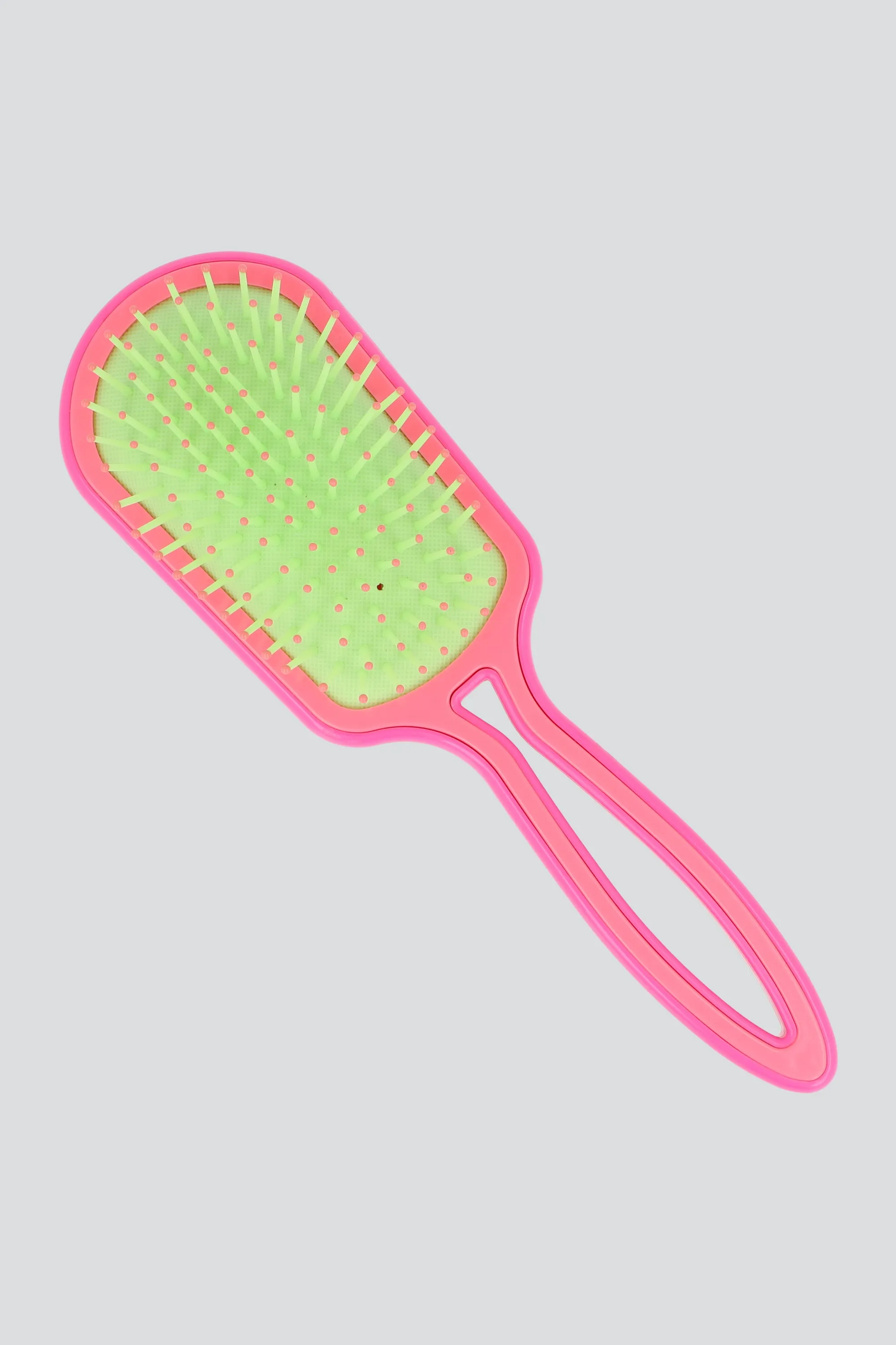 Cepillo multicolor sold by Shasa