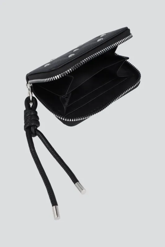 Cartera remaches corazon jareta nudo sold by Shasa