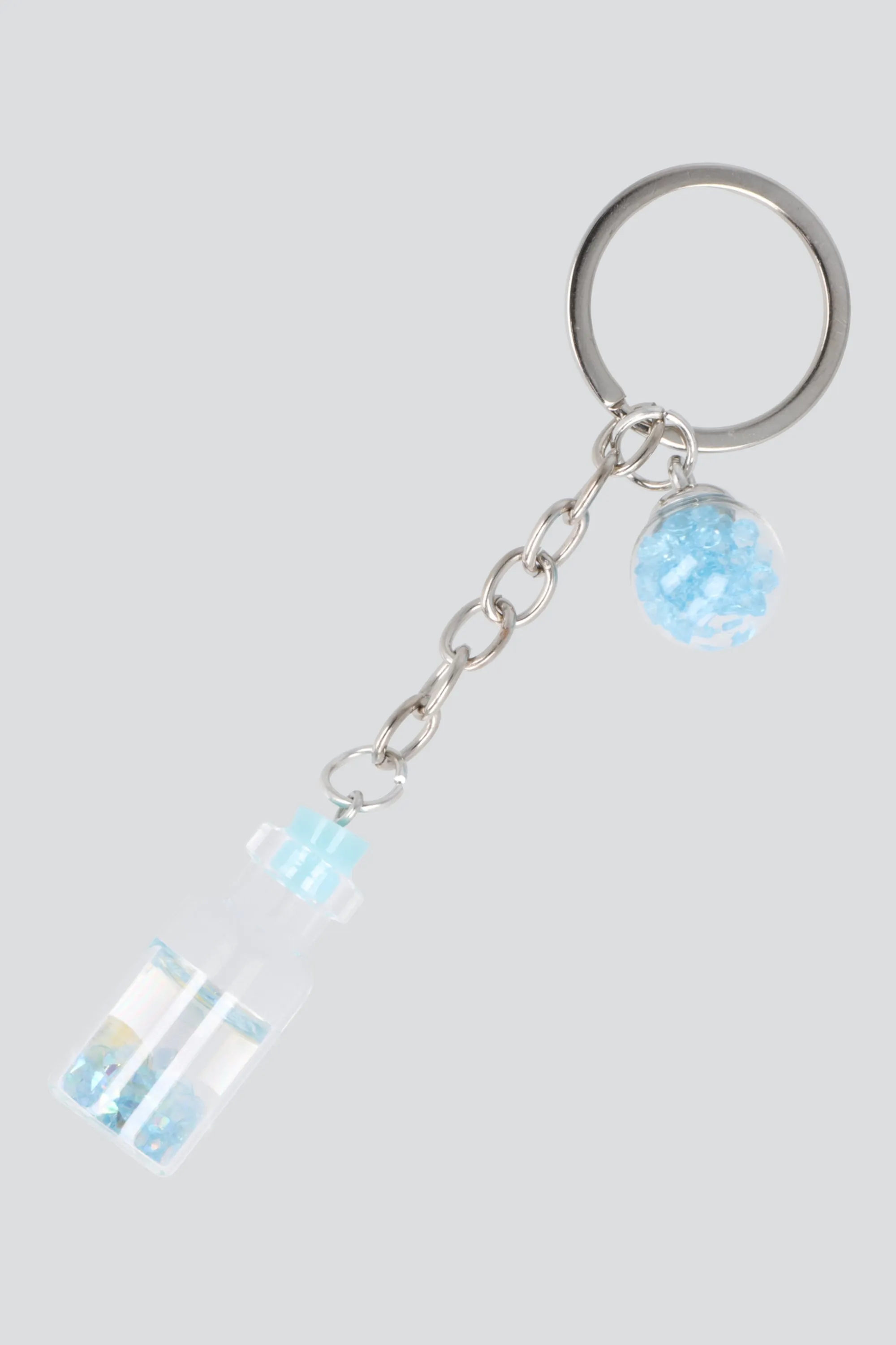 Llavero frasco esfera sold by Shasa