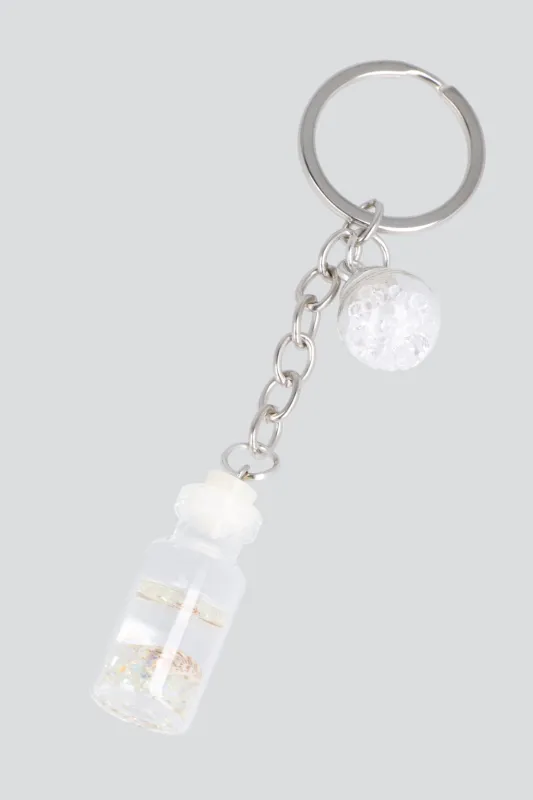 Llavero frasco esfera sold by Shasa