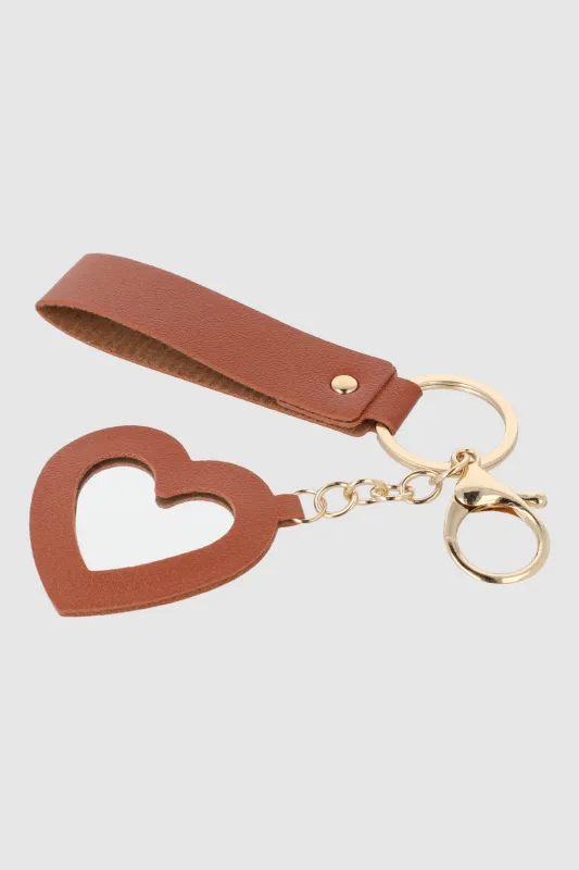 Llavero tira corazón espejo sold by Shasa