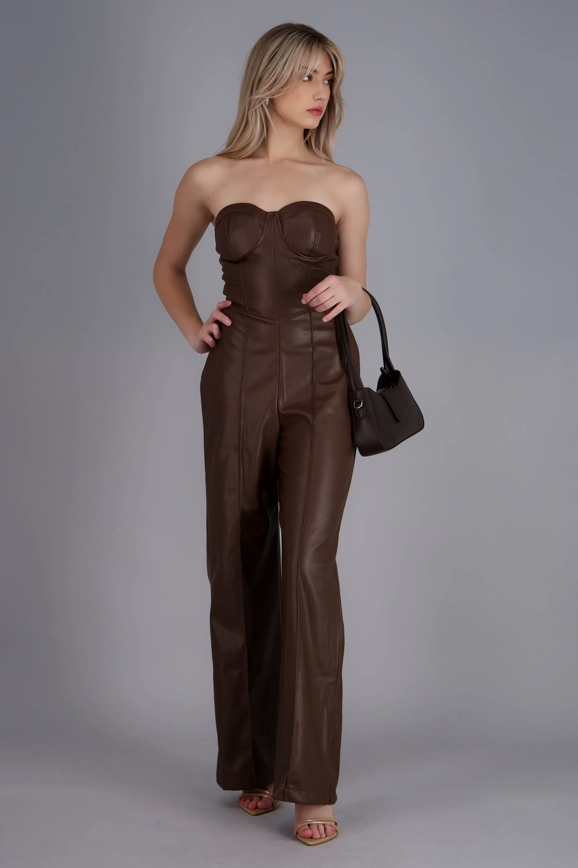 Jumpsuit strapless PU sold by Shasa