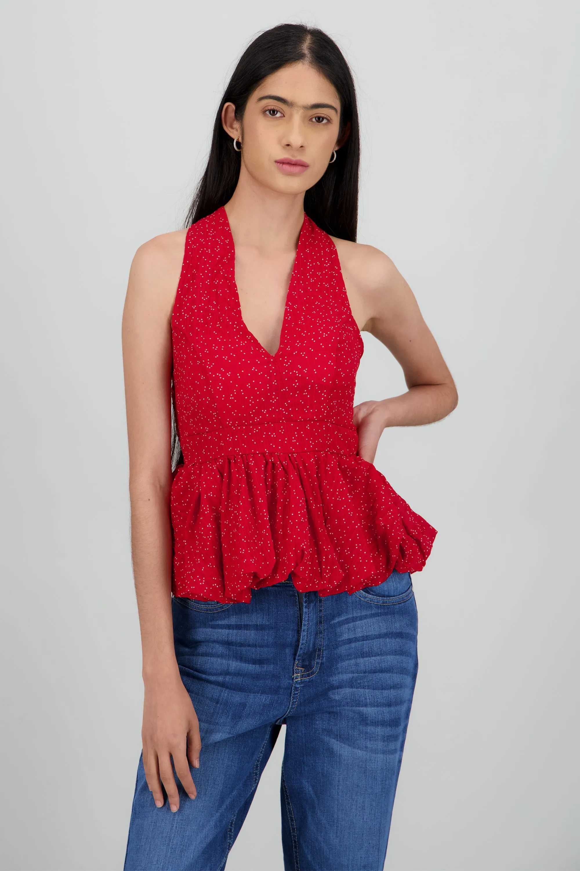 Top halter peplum moteado sold by Shasa