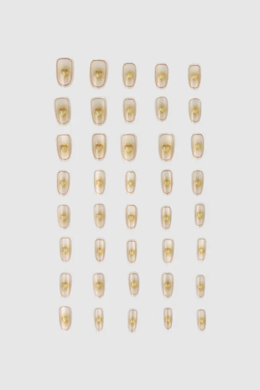 Set 30 uñas corazon efecto ojo de gato sold by Shasa